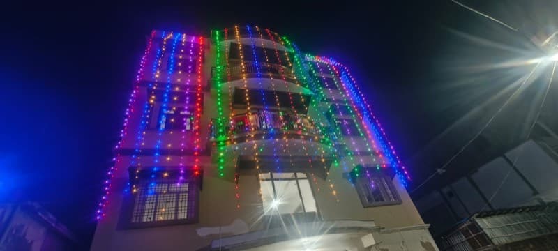 Colorful LED festival lighting on building