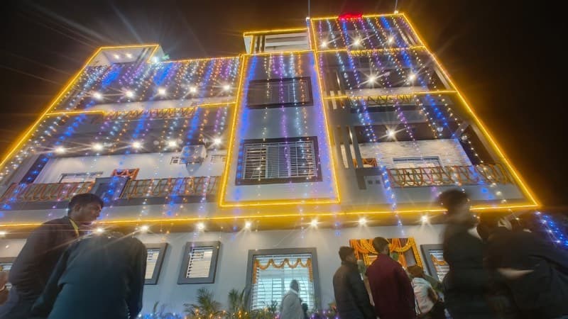 Night view of building with blue and gold lights